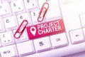 Text sign showing Project Charter. Word for typically short formal document that describes your project Posting New