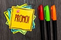 Text sign showing Promo Motivational Call. Conceptual photo Piece of advertising Discount Special Offer Sale Three marker pens fou Royalty Free Stock Photo