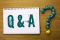 Text sign showing Q A. Conceptual photo Ask Frequently Faq Asked Question Help Solving Doubt Query Support written on Notebook Boo Royalty Free Stock Photo