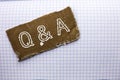 Text sign showing Q A. Conceptual photo Ask Frequently Faq Asked Question Help Solving Doubt Query Support written on tear Cardboa Royalty Free Stock Photo