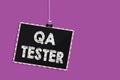Text sign showing Qa Tester. Conceptual photo Quality assurance of an on going project before implementation Hanging blackboard me