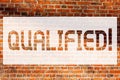 Text sign showing Qualified. Conceptual photo Certified to perform a job Competent Experienced Brick Wall art like Graffiti