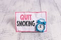 Text sign showing Quit Smoking. Conceptual photo Discontinuing or stopping the use of tobacco addiction. Royalty Free Stock Photo