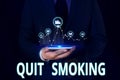 Text sign showing Quit Smoking. Conceptual photo Discontinuing or stopping the use of tobacco addiction Male human wear Royalty Free Stock Photo