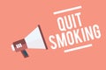 Text sign showing Quit Smoking. Conceptual photo Discontinuing or stopping the use of tobacco addiction Megaphone loudspeaker pink Royalty Free Stock Photo