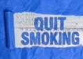 Text sign showing Quit Smoking. Conceptual photo Discontinuing or stopping the use of tobacco addiction Rolled ripped Royalty Free Stock Photo