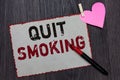 Text sign showing Quit Smoking. Conceptual photo Discontinuing or stopping the use of tobacco addiction White page red borders mar Royalty Free Stock Photo
