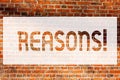 Text sign showing Reasons. Conceptual photo Causes Explanations Justifications for an action or event Motivation Brick Wall art