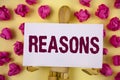 Text sign showing Reasons. Conceptual photo Causes Explanations Justifications for an action or event Motivation written on Sticky