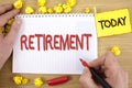 Text sign showing Retirement. Conceptual photo Leaving Job Stop Ceasing to Work after reaching some age written by Man on Notepad Royalty Free Stock Photo