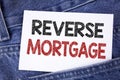 Text sign showing Reverse Mortgage. Conceptual photo Elderly homeowner retirement option regular payment benefit written on Sticky