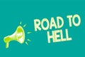 Text sign showing Road To Hell. Conceptual photo Extremely dangerous passageway Dark Risky Unsafe travel Megaphone loudspeaker gre