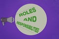 Text sign showing Roles And Responsibilities. Conceptual photo Business functions and professional duties Megaphone with