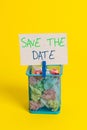 Text sign showing Save The Date question. Conceptual photo asking someone to remember specific day or time Trash bin