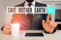 Text sign showing Save Mother Earth. Conceptual photo doing small actions prevent wasting water heat energy Male human