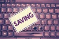 Text sign showing Saving. Conceptual photo economy of or reduction money time or another resource Store