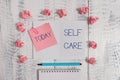 Text sign showing Self Care. Conceptual photo the practice of taking action to improve one s is own health Squared