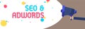 Text sign showing Seo and Adwords. Conceptual photo Pay per click Digital marketing Google Adsense Man holding Megaphone loudspeak