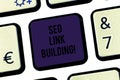 Text sign showing Seo Link Building. Conceptual photo getting other websites to link back your website Keyboard key Royalty Free Stock Photo