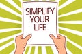 Text sign showing Simplify Your Life. Conceptual photo Manage your day work Take the easy way Organize Paper page capital reportin Royalty Free Stock Photo