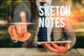 Text sign showing Sketch Notes. Conceptual photo visual notetaking Combination of notetaking and doodling Woman wear Royalty Free Stock Photo