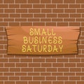 Text sign showing Small Business Saturday. Conceptual photo American shopping holiday held during the Saturday Plank