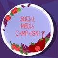 Text sign showing Social Media Campaign. Conceptual photo Use of social networks to promote brands or services Hand