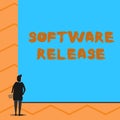 Text sign showing Software Release. Conceptual photo sum of stages of development and maturity for program Man stands in