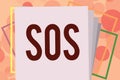 Text sign showing Sos. Conceptual photo Urgent appeal for help International code signal of extreme distress Royalty Free Stock Photo
