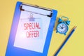 Text sign showing Special Offer. Conceptual photo product or service that is offered free or at a very low price Clipboard paper Royalty Free Stock Photo