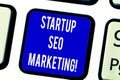 Text sign showing Startup Seo Marketing. Conceptual photo Attract qualified leads while your work improving Keyboard key