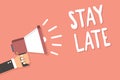 Text sign showing Stay Late. Conceptual photo A routine in which a person goes to somewhere out of time Man holding megaphone loud