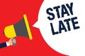 Text sign showing Stay Late. Conceptual photo A routine in which a person goes to somewhere out of time Man holding megaphone loud