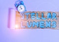 Text sign showing Stellar Lumens. Conceptual photo cryptocurrency platform that uses on remittance and payments Alarm clock and