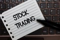 Text sign showing Stock Trading. Conceptual photo Buy and Sell of Securities Electronically on the Exchange Floor Notebook piece p Royalty Free Stock Photo