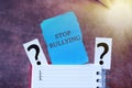 Text sign showing Stop Bullying. Word Written on voicing out their campaign against violence towards victims