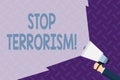 Text sign showing Stop Terrorism. Conceptual photo Resolving the outstanding issues related to violence Hand Holding