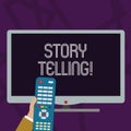 Text sign showing Story Telling. Conceptual photo activity writing stories for publishing them to public Hand Holding