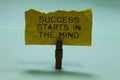 Text sign showing Success Starts In The Mind. Conceptual photo Have positive thoughts accomplish what you want Paperclip hold torn