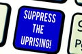 Text sign showing Suppress The Uprising. Conceptual photo Invading and taking control by force To put an end Keyboard Royalty Free Stock Photo