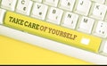 Text sign showing Take Care Of Yourself. Conceptual photo a polite way of ending a gettogether or conversation White pc keyboard