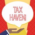 Text sign showing Tax Haven. Conceptual photo country or independent area where taxes are levied at low rate Palm Up in