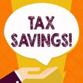 Text sign showing Tax Savings. Conceptual photo means that you pay reduced amount of taxes than normal Palm Up in Supine