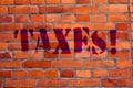 Text sign showing Taxes. Conceptual photo Money deanalysisded by a government for its support Brick Wall art like