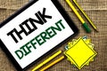 Text sign showing Think Different. Conceptual photo Rethink Change on vision Acquire New Ideas Innovate written on Tablet on the j