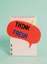 Text sign showing Think Fresh. Conceptual photo Thinking on natural ingredients Positive good environment Spiral notepad