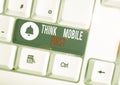 Text sign showing Think Mobile First. Conceptual photo Easy Handheld Device Accessible Contents 24 or7 Handy White pc Royalty Free Stock Photo