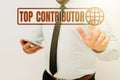 Text sign showing Top Contributor. Internet Concept person who is knowledgeable in a particular category Presenting New