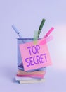 Text sign showing Top Secret. Conceptual photo protected by a high degree of secrecy Highly confidential Sticky note