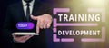 Text sign showing Training Development. Business overview Learn and Expand skills and knowledge Program Royalty Free Stock Photo